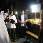 Jelang Muktamar ke-35 NU, Satpol PP Jombang Bagikan 500 Kerudung ke Pedagang